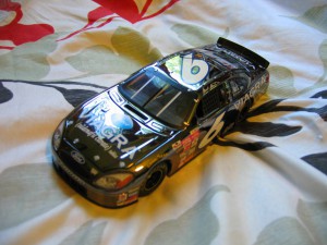 Unnecessarily fancy model car with 'Viagra' printed on it.
